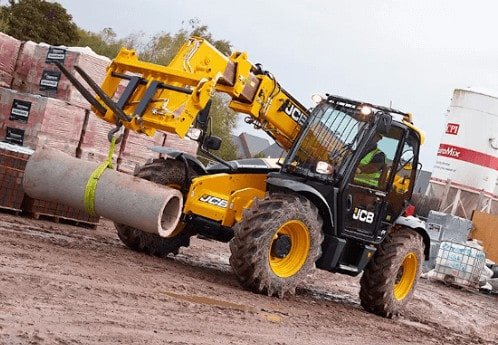 Photograph is showing telescopic loader dealing with loads