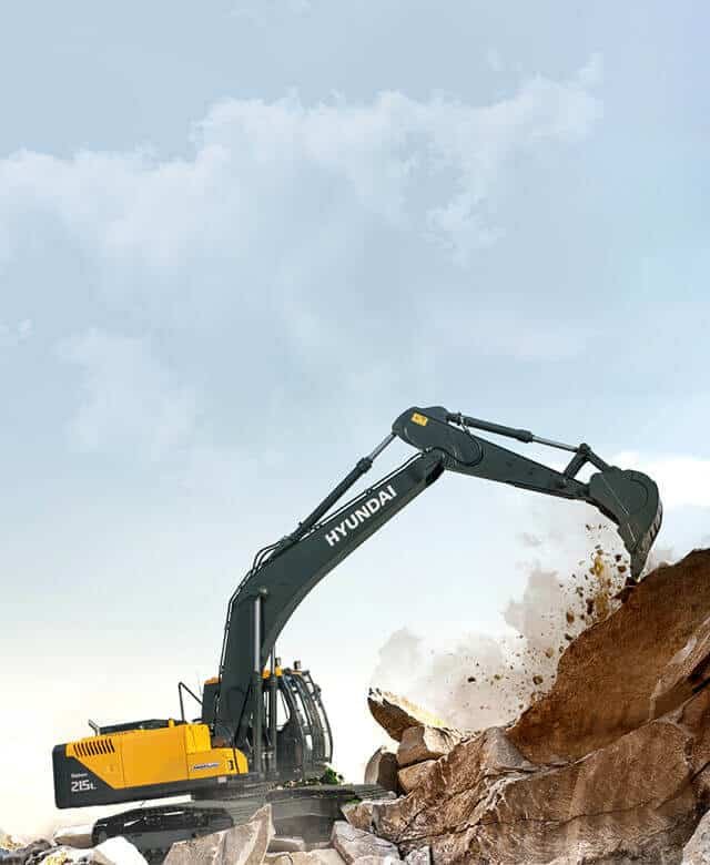 Photograph of a crawler excavator excavating through rocks
