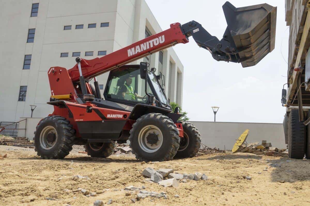 Photograph is showing telescopic loader working efficiently