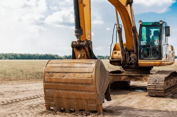 Photograph Showing applications of crawler excavators in agriculture sector