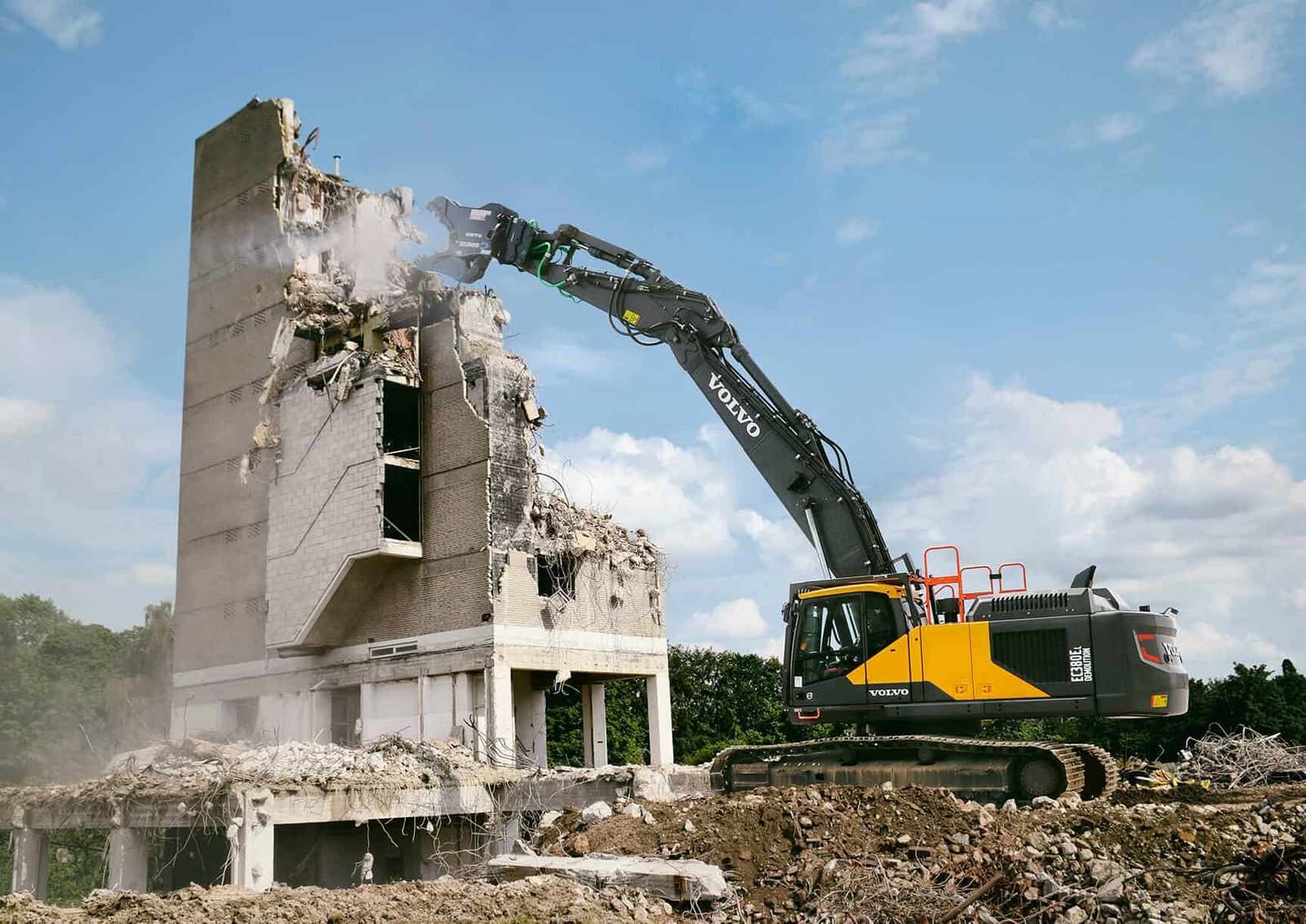 Onsite photograph of crawler excavators during demolition