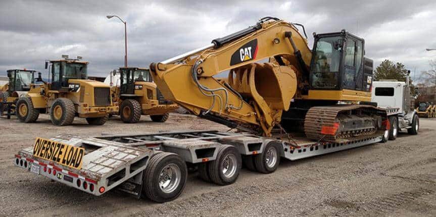 transporting CAT construction machinery or equipment