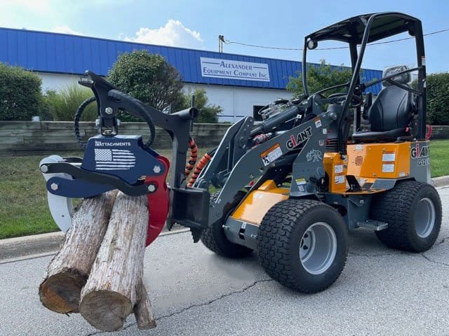 compact skid steers carrying woods