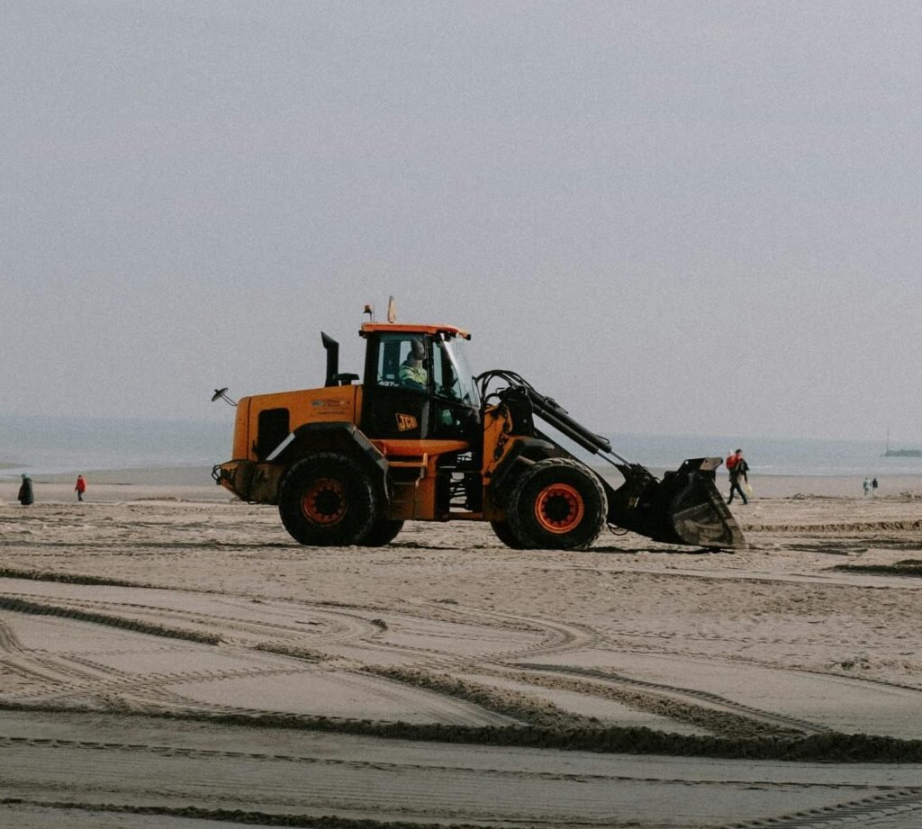 Tractor Smoothing Out Beach