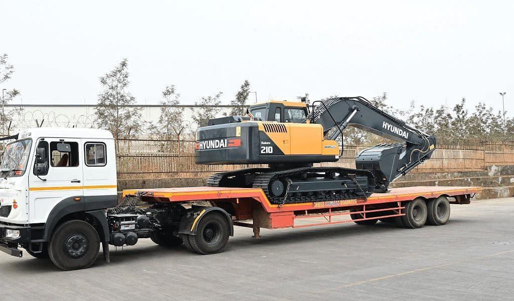 transporting excavators