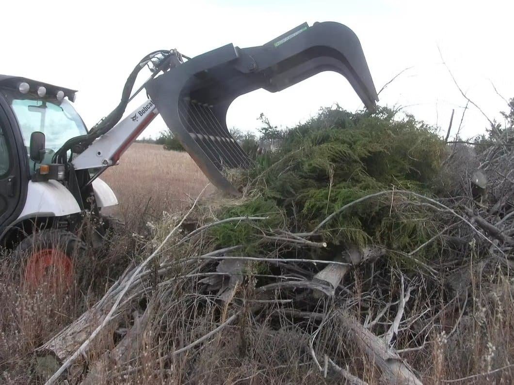 skid steer Grapple Rake application