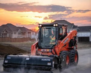 Skid Steers with sunset